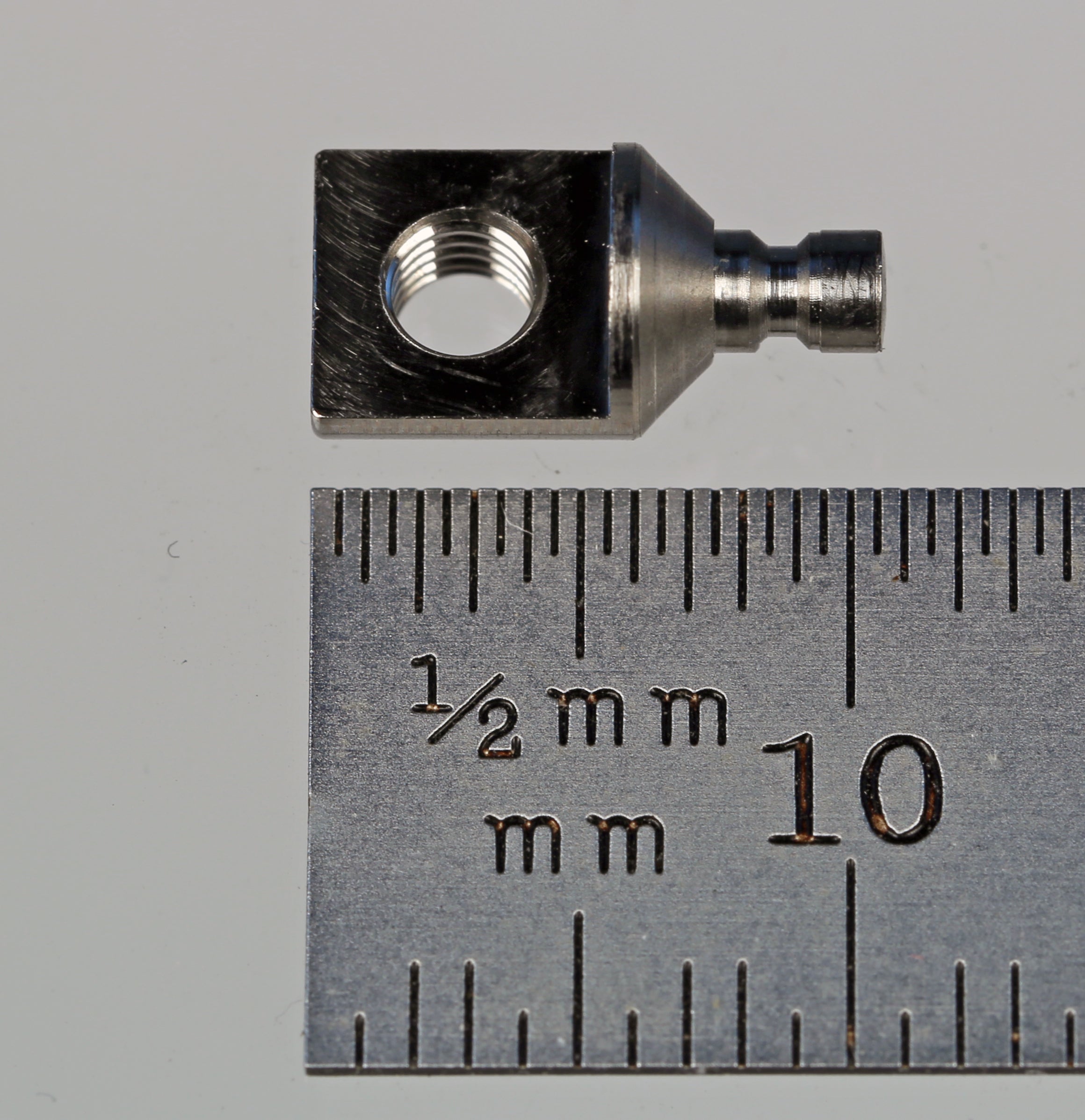JM3-90-PF M3 titanium right-angle fitting for rotary adapter by Q-Mark Manufacturing, Inc.
