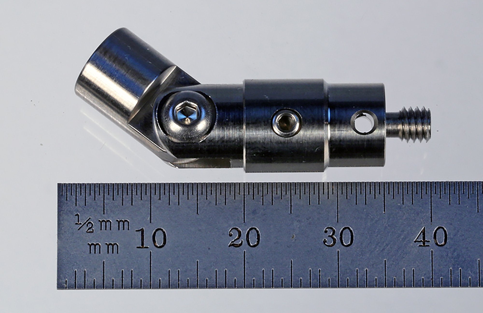 RJM4-33 M4 stainless steel rotary knuckle with ball bearing and clevis, 33.0 mm long.