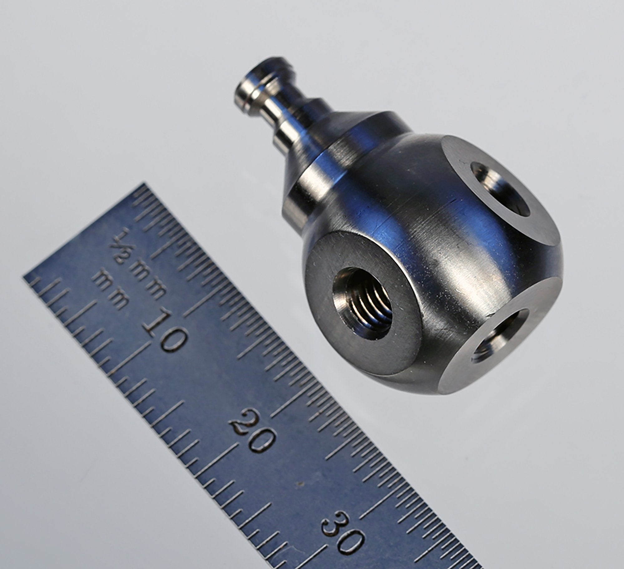 WM5-15-3-T-PF M5 Pro Fit three-sided titanium cube with four tapped holes by Q-Mark Manufacturing, Inc.