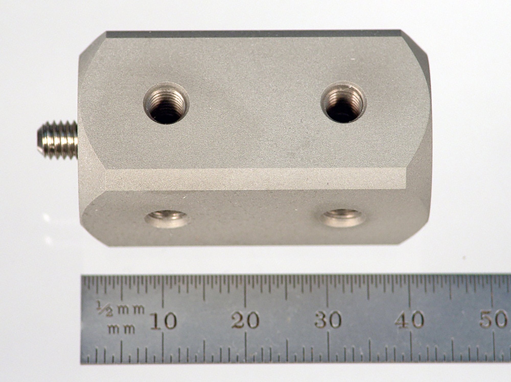 WM5-40 M5 cube, hard anodized aluminum, 42.0mm long, with ten tapped holes.