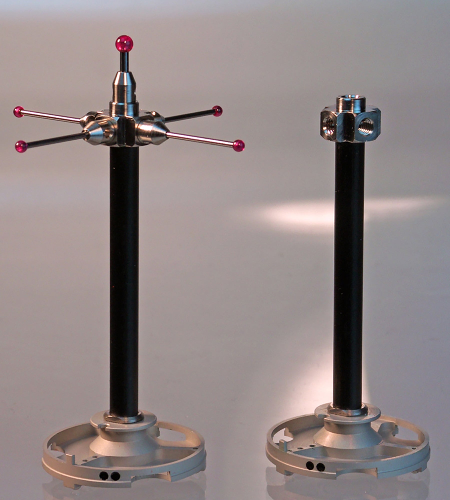 Vast XXT adapter plate with ID chip, gold-plated balls, carbon fiber extension, and titanium end fitting.